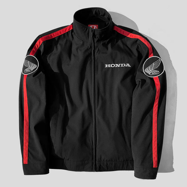 Black jacket with red accents and Honda logo on a light gray background
