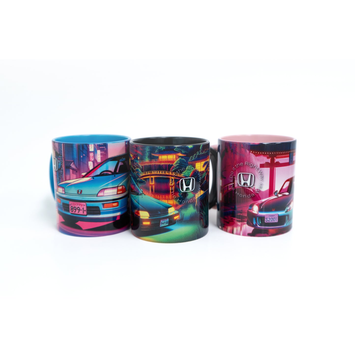 Three mugs with colorful car designs on a white background