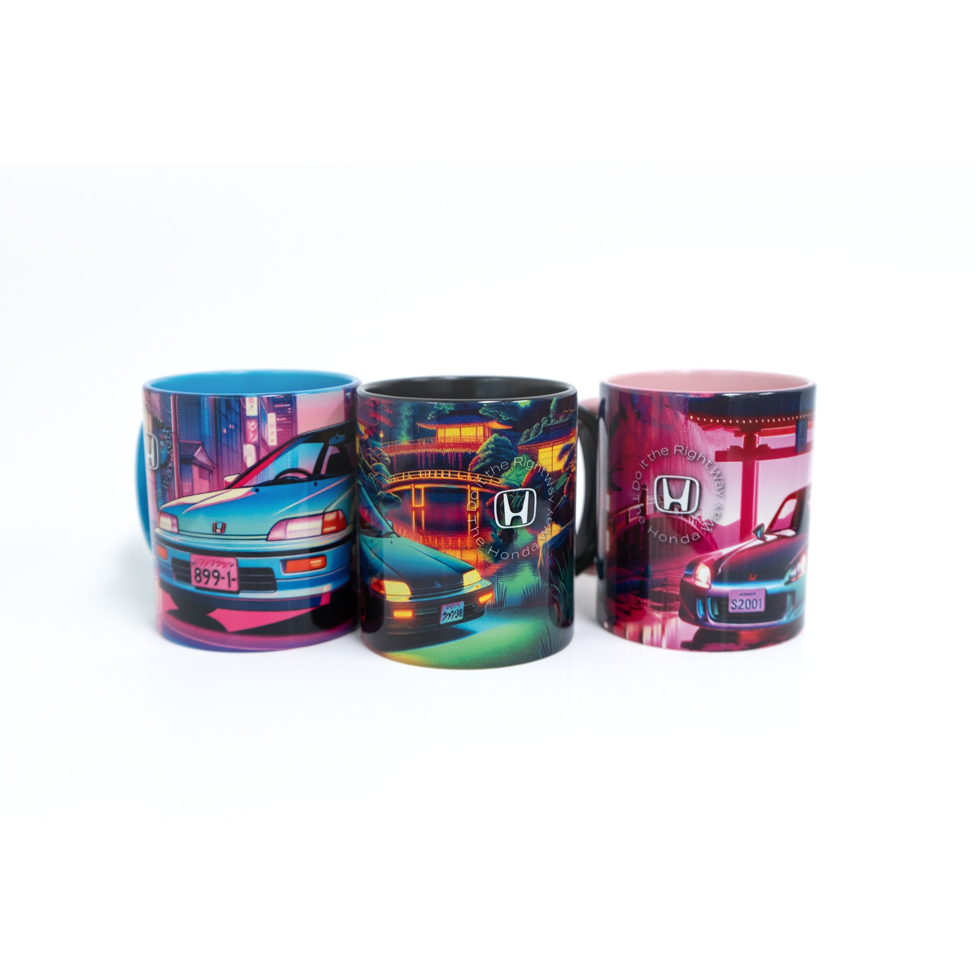 Three mugs with colorful car designs on a white background