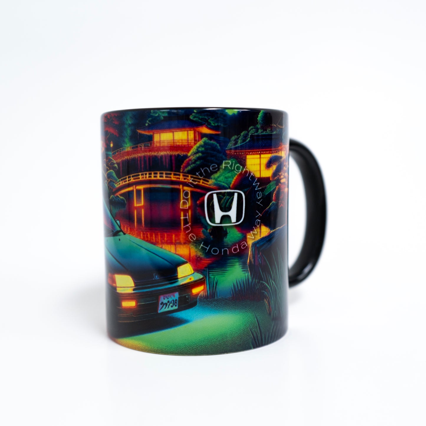 Mug with a colorful design of a car and a building, featuring the Honda logo.