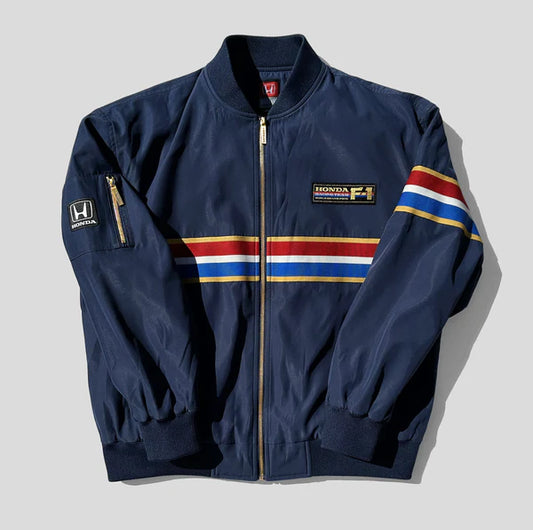 Navy blue jacket with colorful stripes and Honda logo on a light gray background